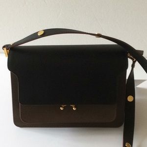 Marni trunk bag in black and brown leather.